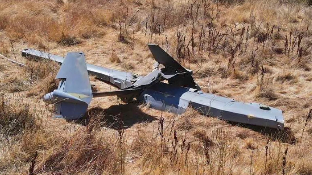 A Kc-46 pegasus boom seen after breaking off and falling to the ground
