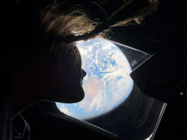 Artemis II astronaut looks out at the moon ahead of lunar flyby