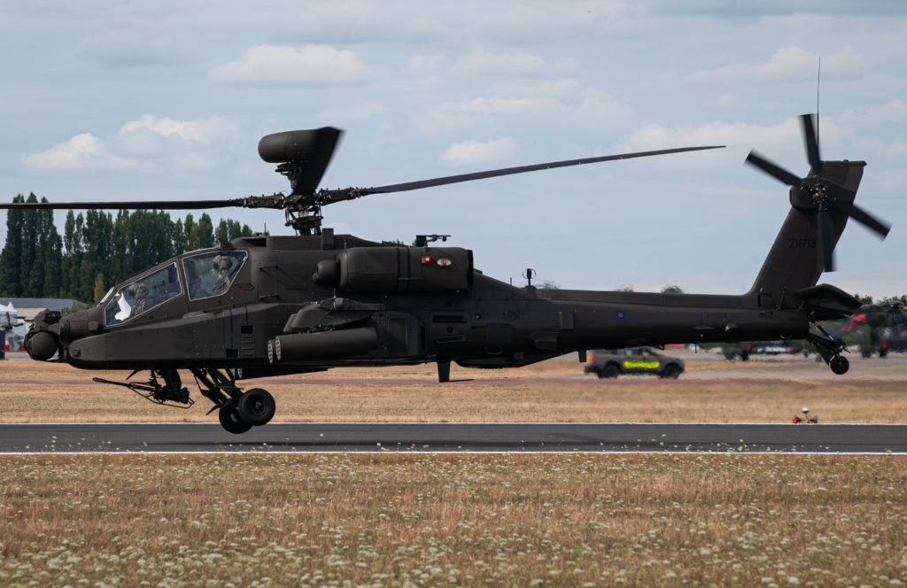 A British AH-64E Apache AH2 (serial ZM713) - operated by the Army Air Corps' No 673 Squadron - departs RAF Fairford in Gloucestershire, UK, after participating in the flying display on the opening day of RIAT 2025 in July, last year. Image: Khalem Chapman